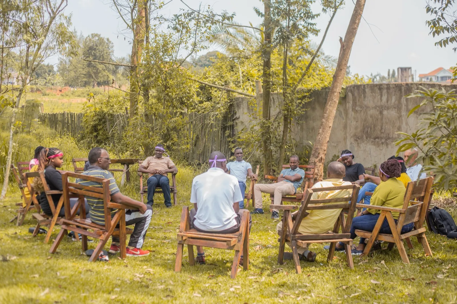 People seated in a circle for a thoughtful group conversation