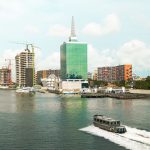 Lagos waterfront skyline with a ferry crossing the harbour