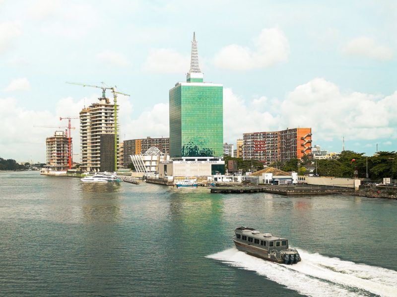 Lagos waterfront skyline with a ferry crossing the harbour
